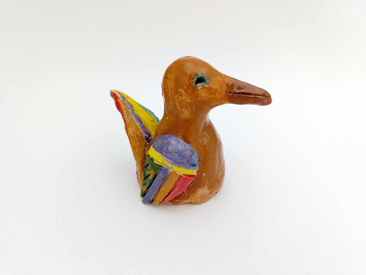 Птица с разноцветным хвостом